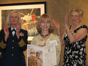 Vice Commandant of the Coast Guard, VADM Sally Brice-O'Hara and Salmagundi Club president Claudia Seymour present Karen Loew, KLoew, Coast Guard Art Program (COGAP) artist, with the USCG Publice Service Award for her painting "Mission of Compassion